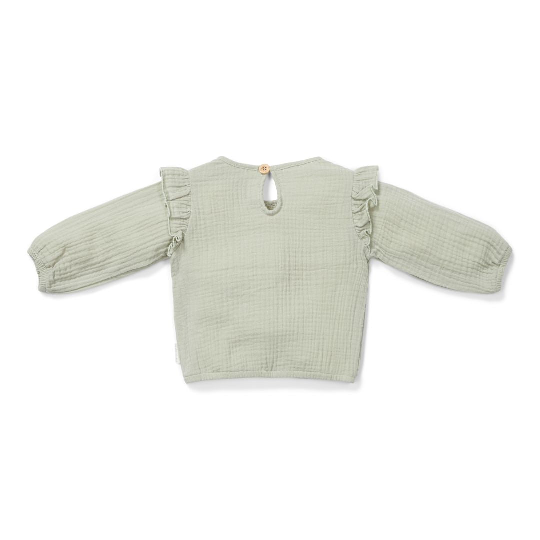 Little Dutch Musselin-Bluse Grass Green – weitere Ansicht mit Bruststickerei und elastischen Bündchen