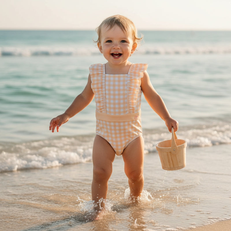 Badeanzug Sunshine Checks von Little Dutch – gelber Kinderbadeanzug mit Volants