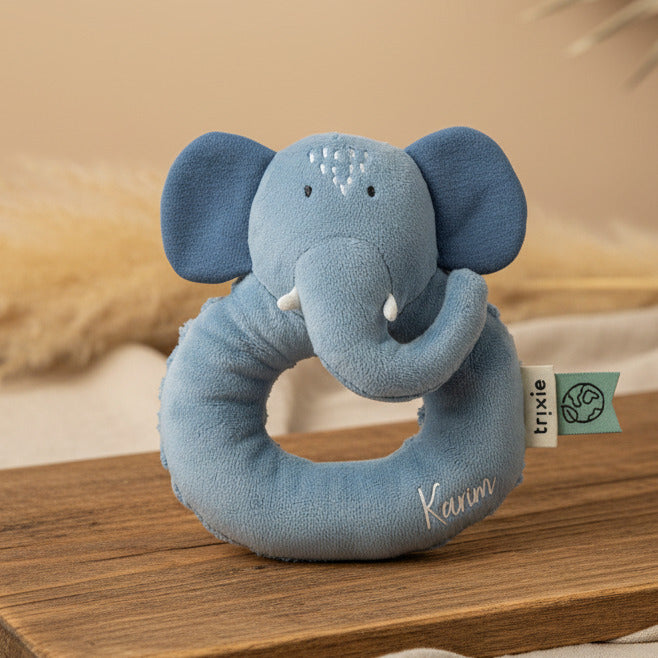 Trixie Rassel Frau Elefant – blaue Stoffrassel auf einer Holzfläche